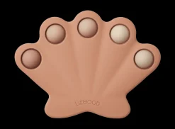 Jouet coquillage pop it en silicone Anne pop toy rose pâle - Liewood