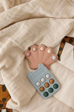 Jouet coquillage pop it en silicone Anne pop toy rose pâle - Liewood